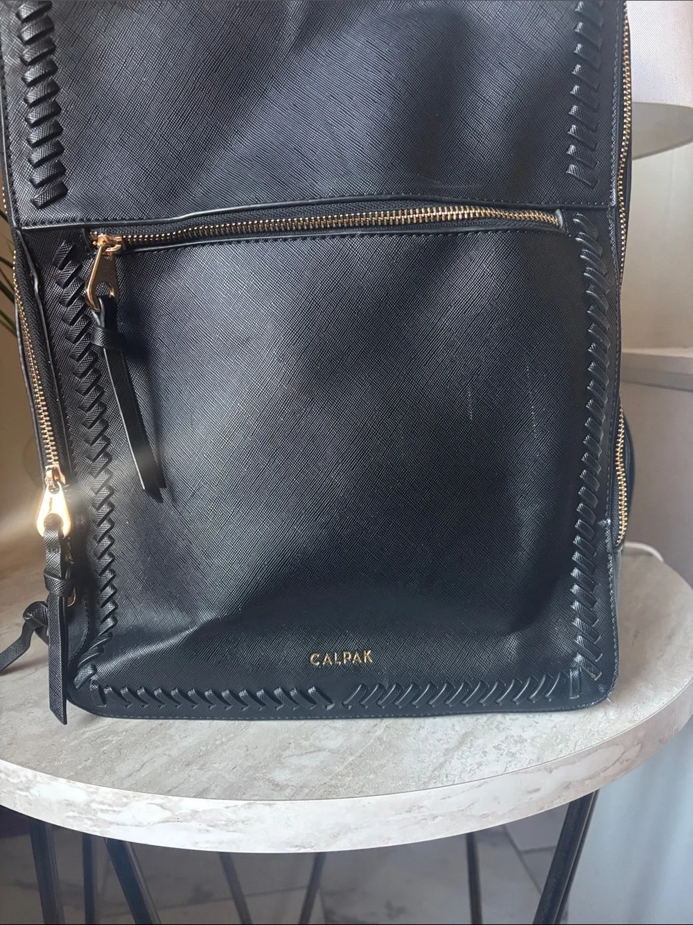Calpak Black Backpack with Gold Hardware and Braided Trim